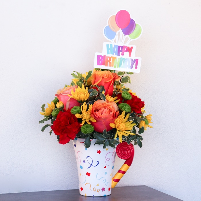 Happy Birthday Flower Bouquet in Celebrate Mug