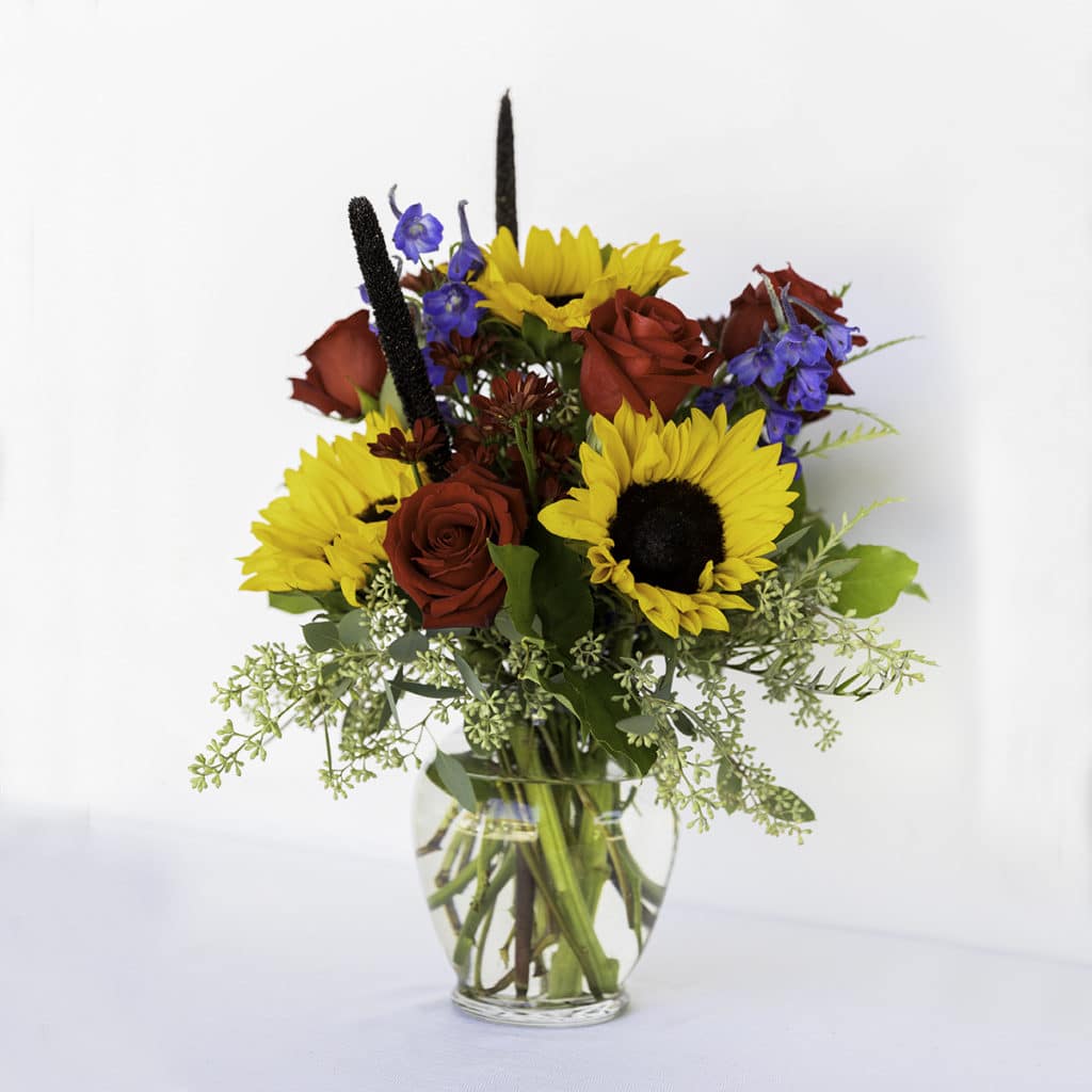 sunny-skies-bouquet-with-sunflowers-blue-delphinium-more